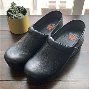 Dansko XP floral embossed clogs